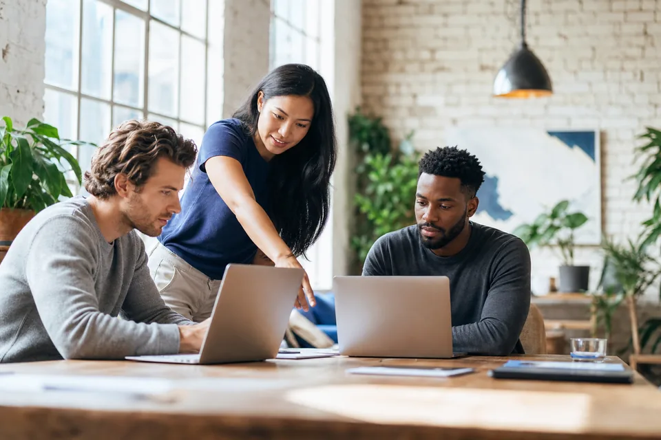 Startup team working together in a bright loft office